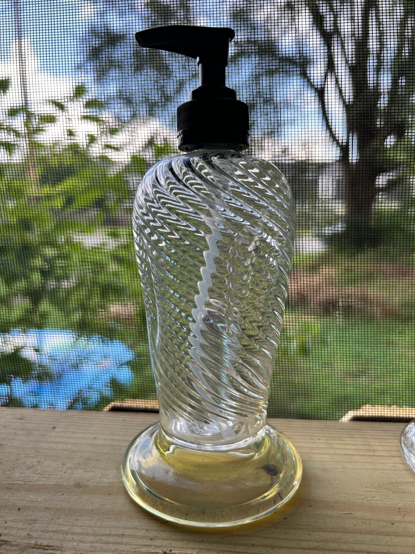 scalloped soap dispenser with dichro mib inside