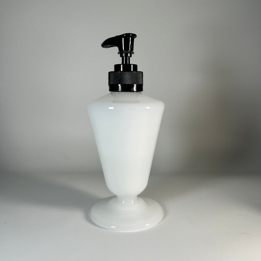opaque white soap dispenser