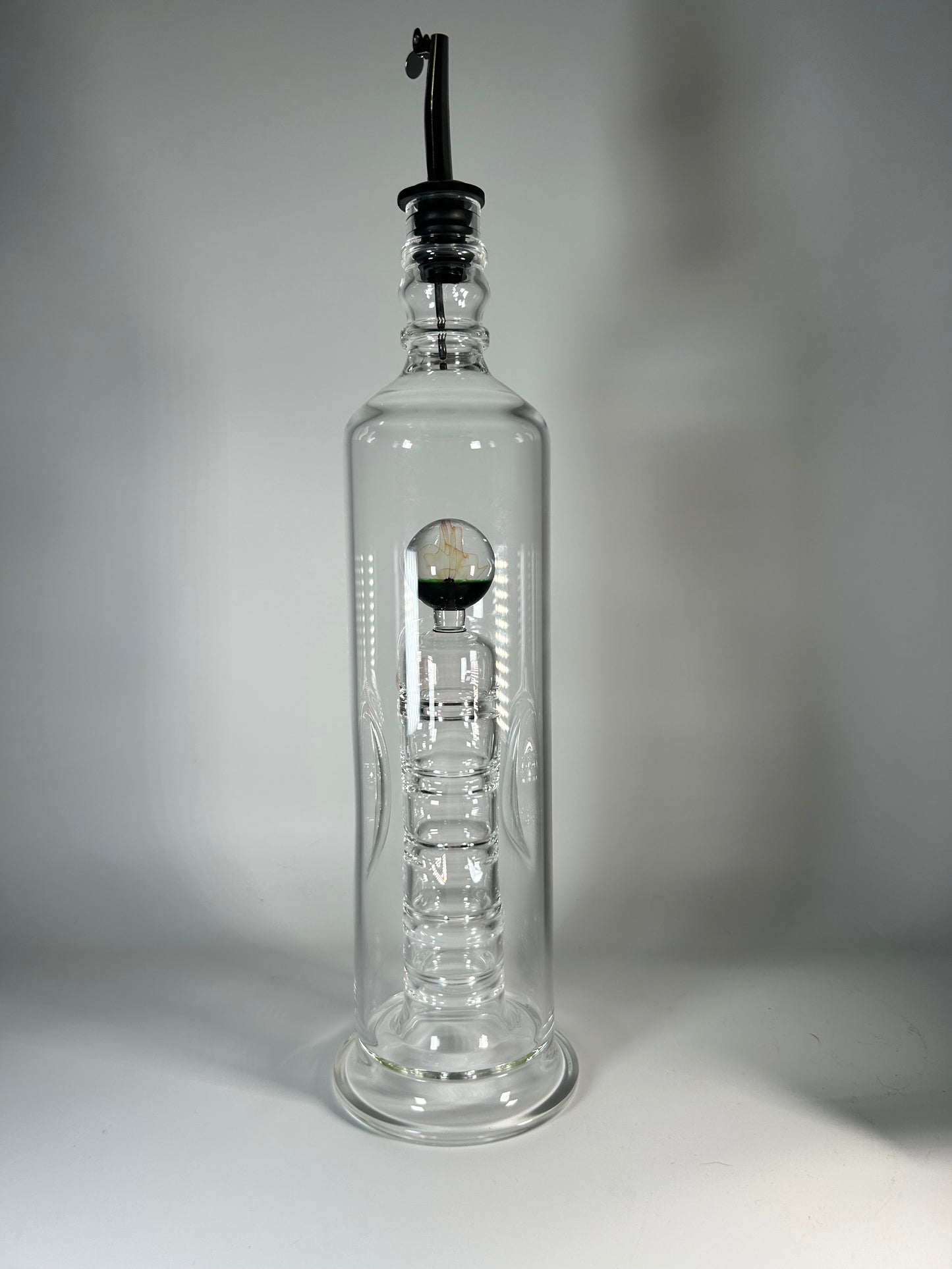 worked olive oil bottle with fume marble