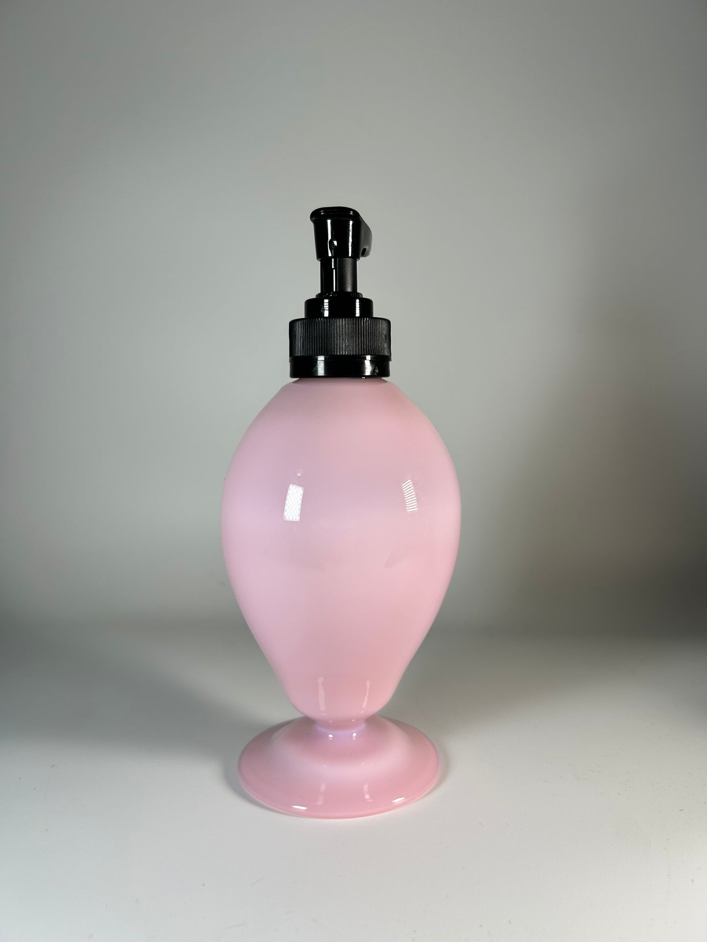 milky pink soap dispenser